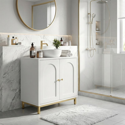 Meuble-lavabo moderne 24,8 po avec lavabo, armoire autoportante blanche avec pieds dorés et meuble-lavabo à porte arquée pour petits espaces