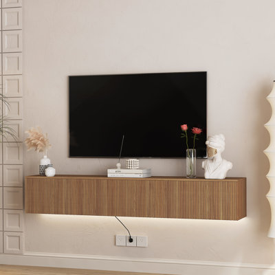 Meuble télé flottant mural avec lumières DEL et beaucoup de rangement, idéal pour le divertissement à domicile et les objets décoratifs