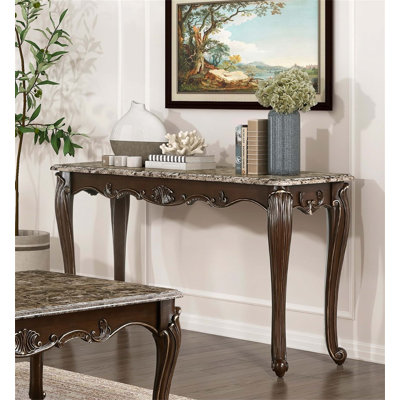 Table de canapé formelle traditionnelle de luxe avec plateau en marbre avec inclinaison élégante pour le décor du salon