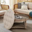 Table basse ronde avec repose-pieds-546053374