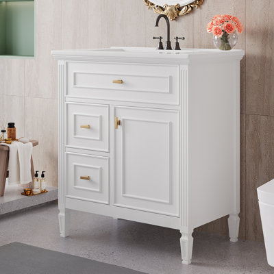 Meuble-lavabo de salle de bain avec lavabo, un tiroir rabattable, deux tiroirs et une tablette réglable