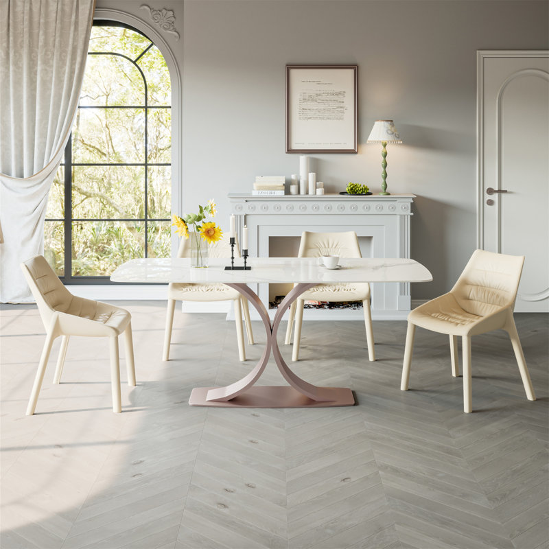 Élégante table de salle à manger en cuivre et en acier au carbone rouge avec plateau en pierre de montagne brillant Capacité de charge de 109,5 kg