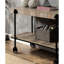 Rectangular Industrial Desk With Natural Tone Finish And Open Bottom Shelf For Office Transitional Table Replicated Wheel Legs In