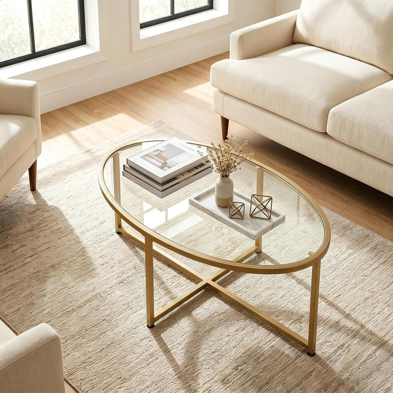 Table basse ovale en verre doré