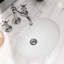 Lavabo de salle de bain ovale encastré en céramique blanc avec trop-plein