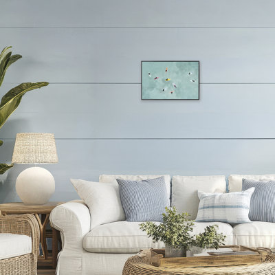 Surfers Floating On Waves Framed Giclee, design by Lily K.