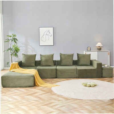 4-Seat Modular Sectional Sofa With Oversized Chaise And Ottomans For Compact Living Spaces.