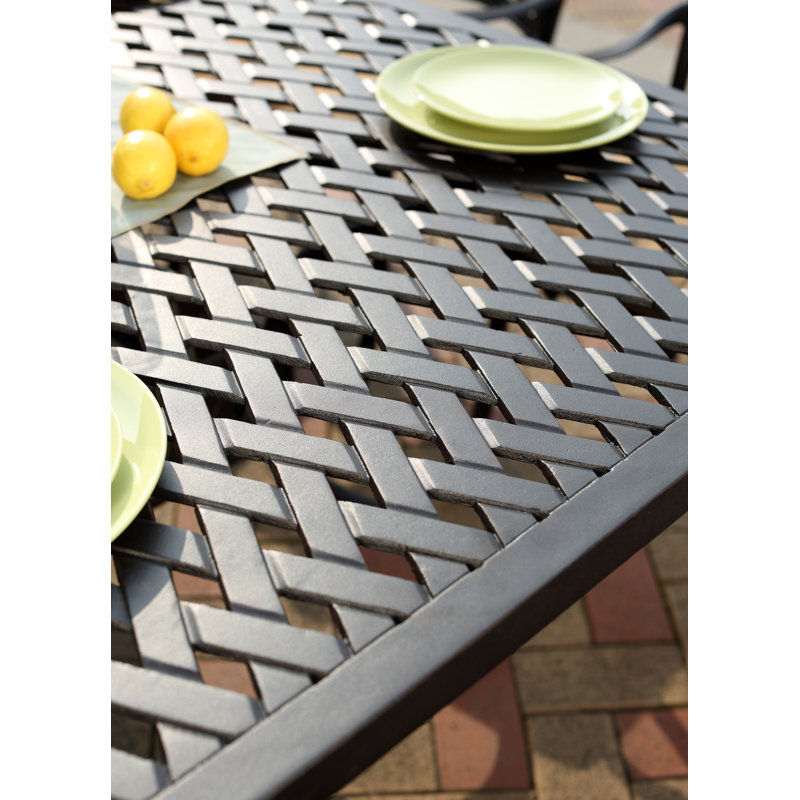 Caseyville 9-Piece Patio Dining Set (with 2 Swivel Rockers) with Cushions and 42 x 84" Rectangular Dining Table