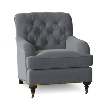 Fauteuil à coussin en duvet capitonné Devan