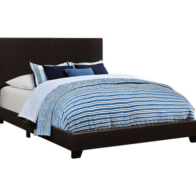 Grand lit brun tapissier - offrant un panneau de chambre à coucher confortable et élégant avec un mobilier de revêtement moderne