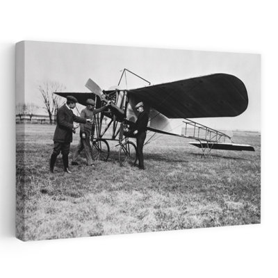 1910S Group Of Three Men Standing In Front Of Early Monoplane One With Hand On Propeller Classic Retro Vintage Wall Art