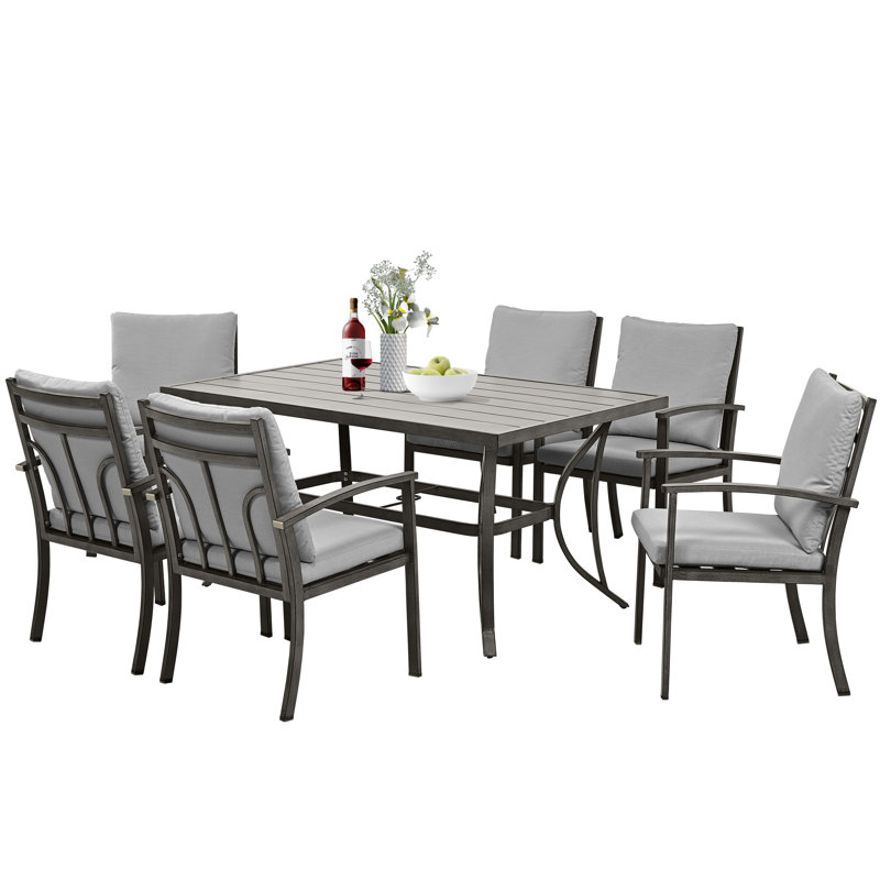 Germien 6 - Person Patio Dining Set with Rectangular Table , Cushions Included