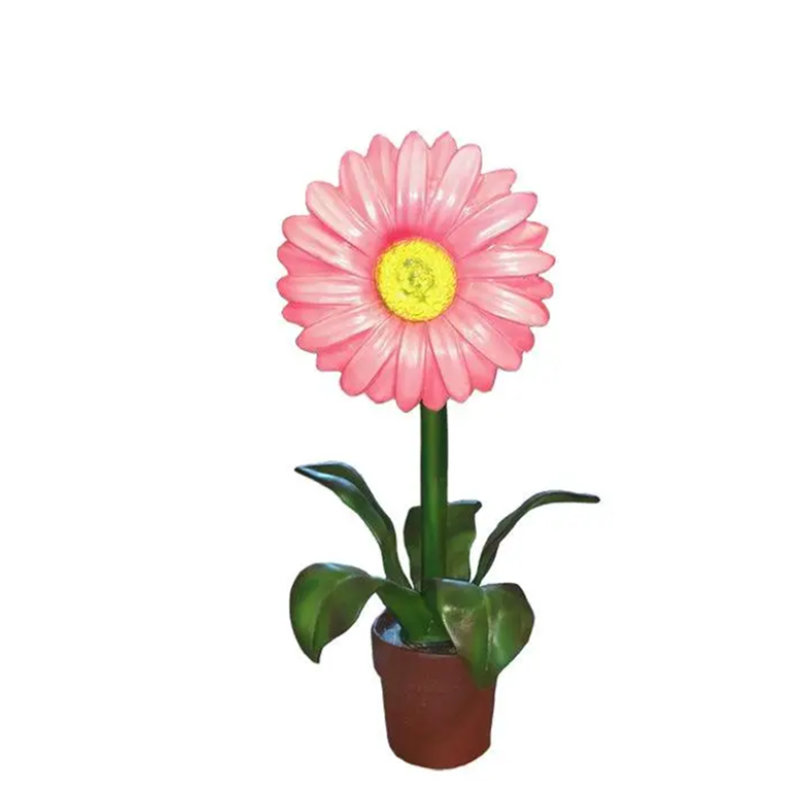 Petite statue de marguerite rose en pot