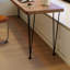 Bureau rectangulaire brun et noir en bois massif et fer-156239779-156239776