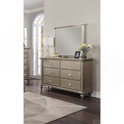 Commode de luxe avec finition argentée et champagne