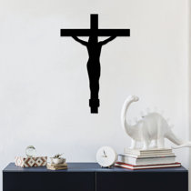 Cross or crucifix on light beige background. Clean simplistic design. Stock  Photo