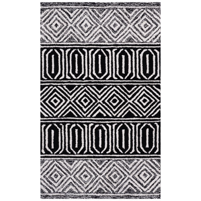 Tapis ivoire / noir Capri 702