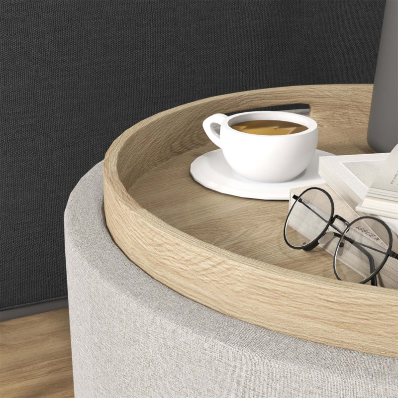 Table basse ronde avec repose-pieds avec plateau rabattable, parfaite pour une utilisation multifonctionnelle et un rangement caché.