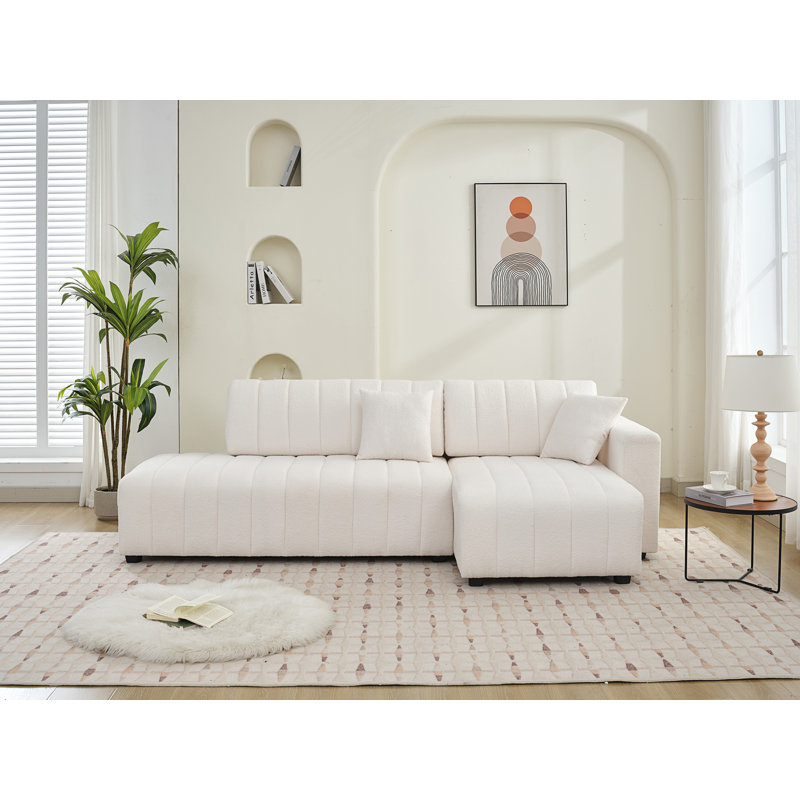 Canapé d'angle capitonné en L avec coussins décoratifs d'inspiration scandinave, canapé de salon