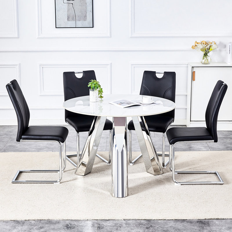 Table ronde et chaise de 42 po - Plateau en pierre frittée, pieds en métal, chaises de salle à manger noires avec support argenté, polyvalent et élégant, plateau de table en acier inoxydable de 42 po