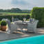 Crimora 4 - Person Wicker Patio Dining Set with Round Table , Cushions Included