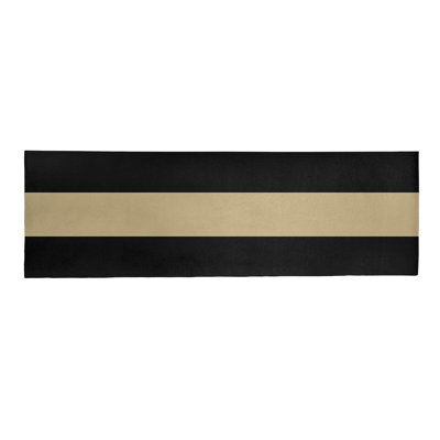 Tapis doré/noir