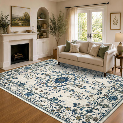 Tapis d'intérieur lavable en machine à motif floral bleu vintage, couleur crème ivoire, antidérapant et à poils courts.