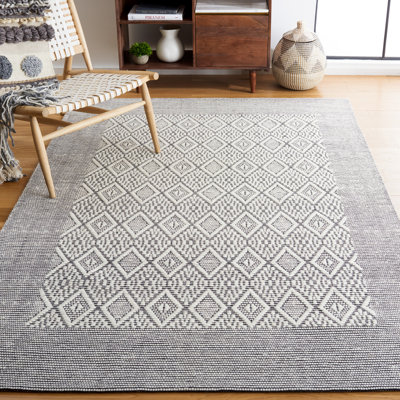 Tapis géométrique noir / ivoire en laine tissé à la main Vermont