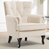 Elegant Upholstered Wingback Armchair with Exquisite Nailhead Trim