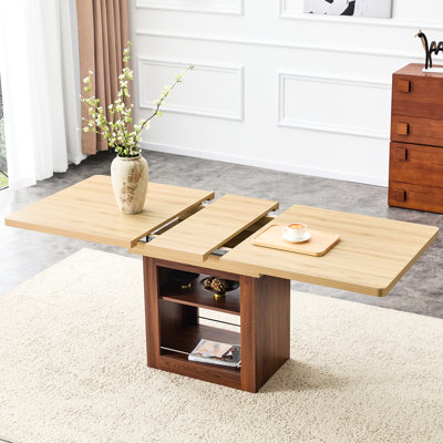 Table de salle à manger extensible avec mécanisme télescopique, idéale pour accueillir de 4 à 8 personnes dans des espaces modernes.