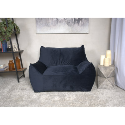 Pouf poire bleu nuit. Siège élégant et confortable. Garnissage en mousse pour un moelleux incomparable. Housse amovible zippée. 102 x 102 x 76 cm, 24 kg. Design moderne et confortable. Housse résistante.