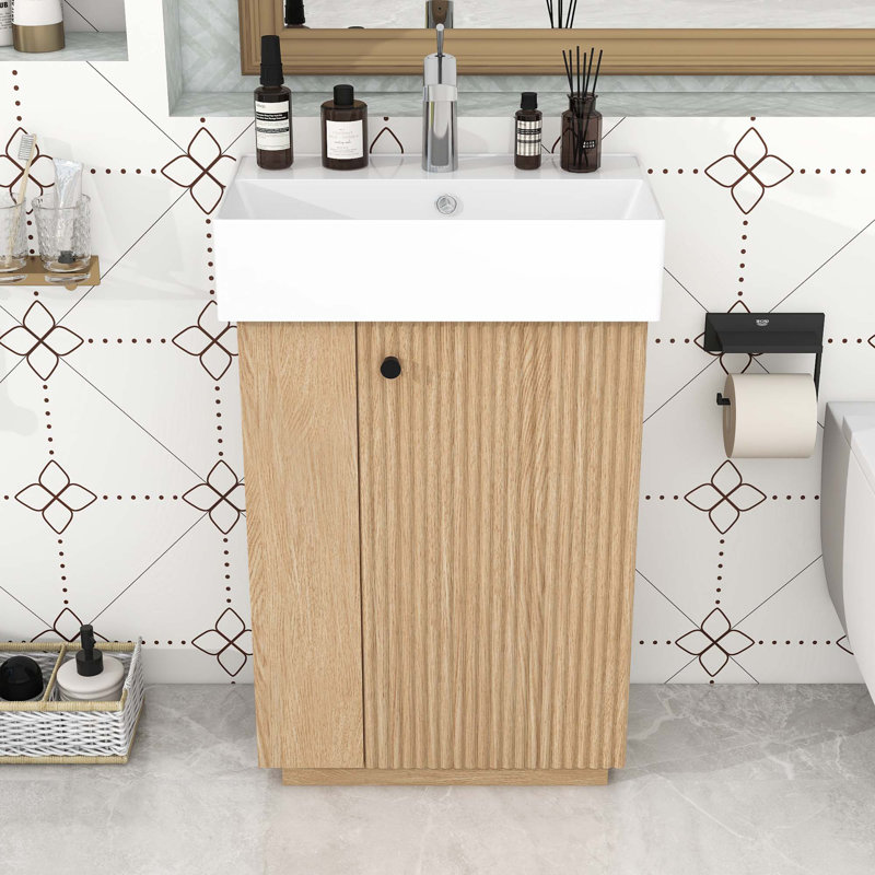 Meuble-lavabo de salle de bain avec lavabo en céramique, porte à fermeture en douceur et tablettes réglables