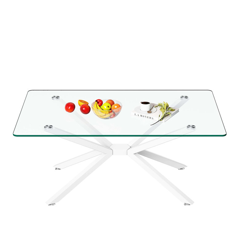 Élégante table basse rectangulaire en verre transparent avec pieds en métal pour un salon moderne, durable et facile à nettoyer