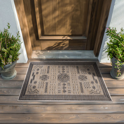 Tapis intérieur / extérieur noir et beige à motif géométrique Diana