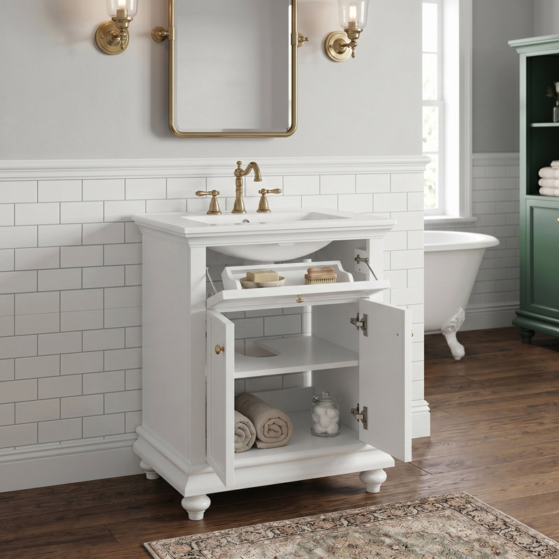 Meuble-lavabo moderne de 24 po avec tiroir basculant, blanc, rangement étagé et sur mesure, structure à dossier ouvert et pieds tournés en boule, fonctionnement silencieux