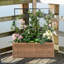 Boîte à fleurs avec treillis