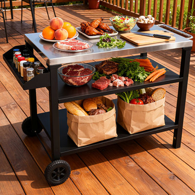 Chariot à 3 roulettes avec plateau supérieur en acier inoxydable et tablette latérale, table de préparation mobile pour la cour arrière, conception de conception noire, besoins de cuisson en plein air améliorés, stabilité de mouvement en douceur,