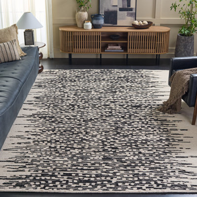 Metro Hand Tufted Wool/Cotton Abstract Rug in Ivory/Black