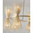 12-Light Gold Iron Chandelier With Spiked Cone Shades