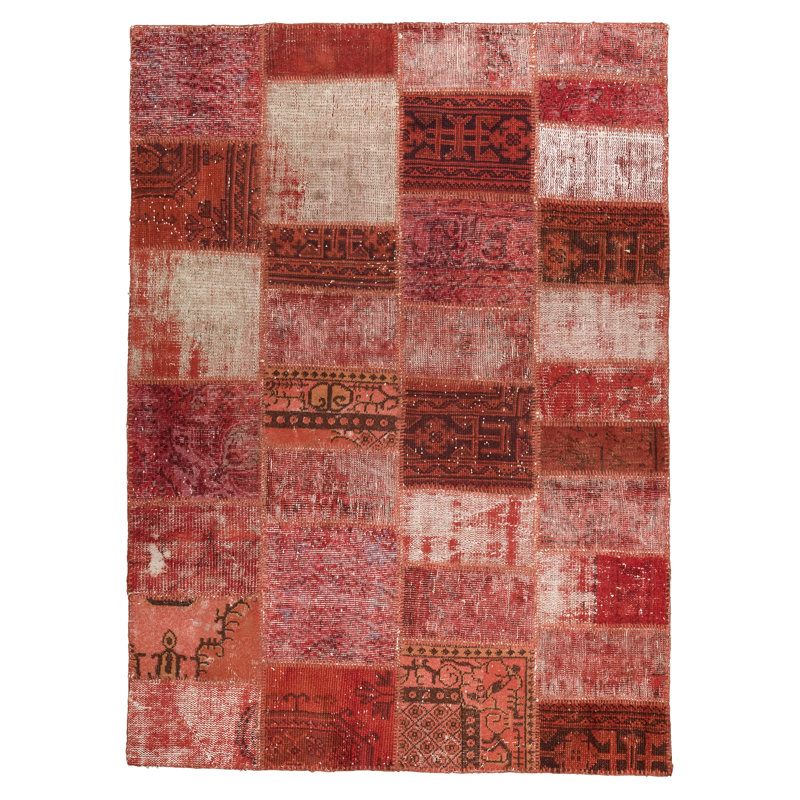 Tapis rouge en laine noué à la main