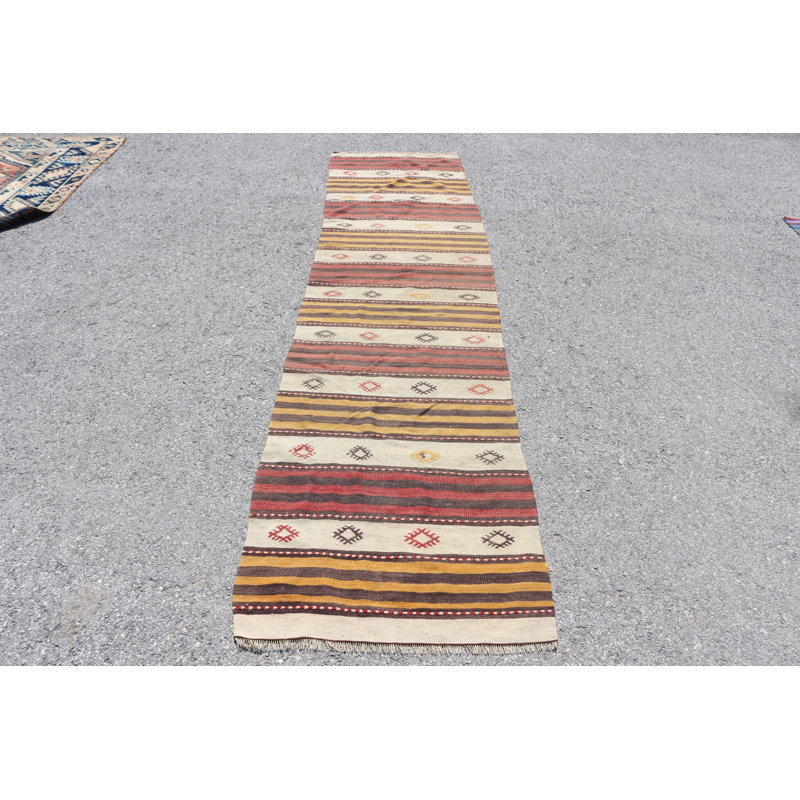 Chemin de table turc rétro vintage en beige pour les couloirs avec un design bohémien authentique, idéal pour une décoration éclectique et chic