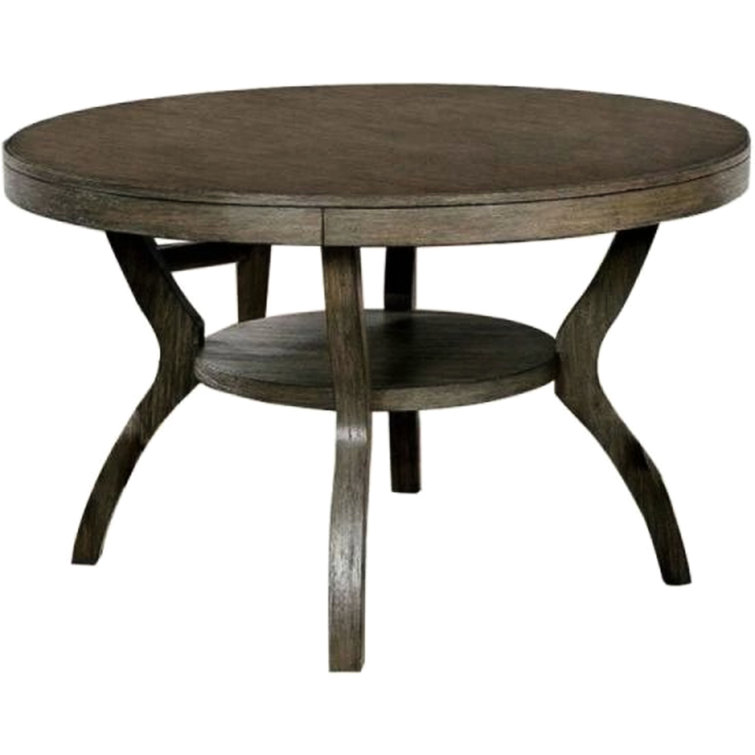 Table transitionnelle en bois massif avec tablette pour salle à manger dans une pièce rustique de couleur grise