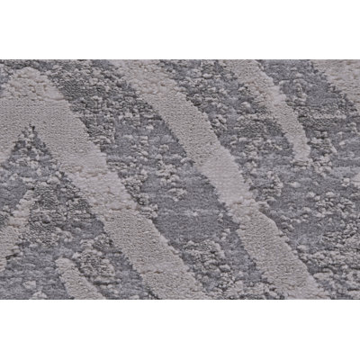 Tapis gris à motif de chevrons Jollanta