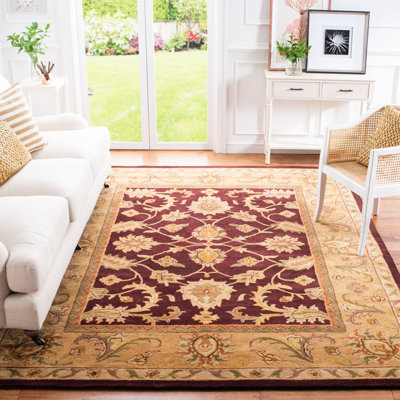 Tapis prune foncé / doré en laine touffeté à la main Bromley