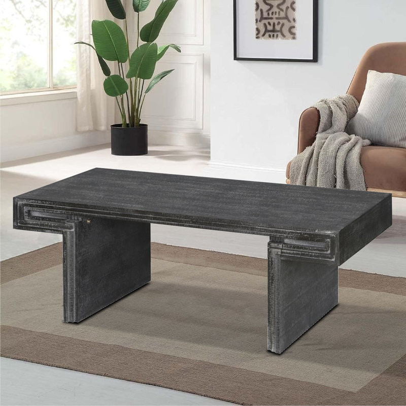 Table basse moderne avec table basse et base géométrique