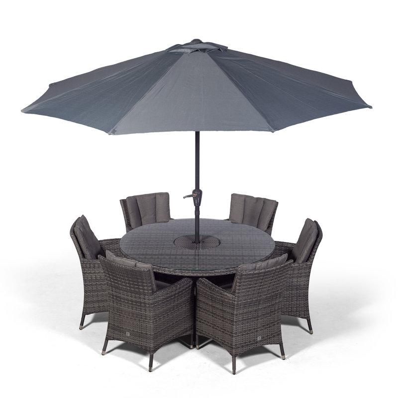 Karcher 6 - Person Wicker Patio Dining Set with Round Table , Cushions Included, Grey