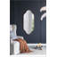 Miroir mural champagne doré avec bords entaillés, parfait pour améliorer l'esthétique et la luminosité de la pièce