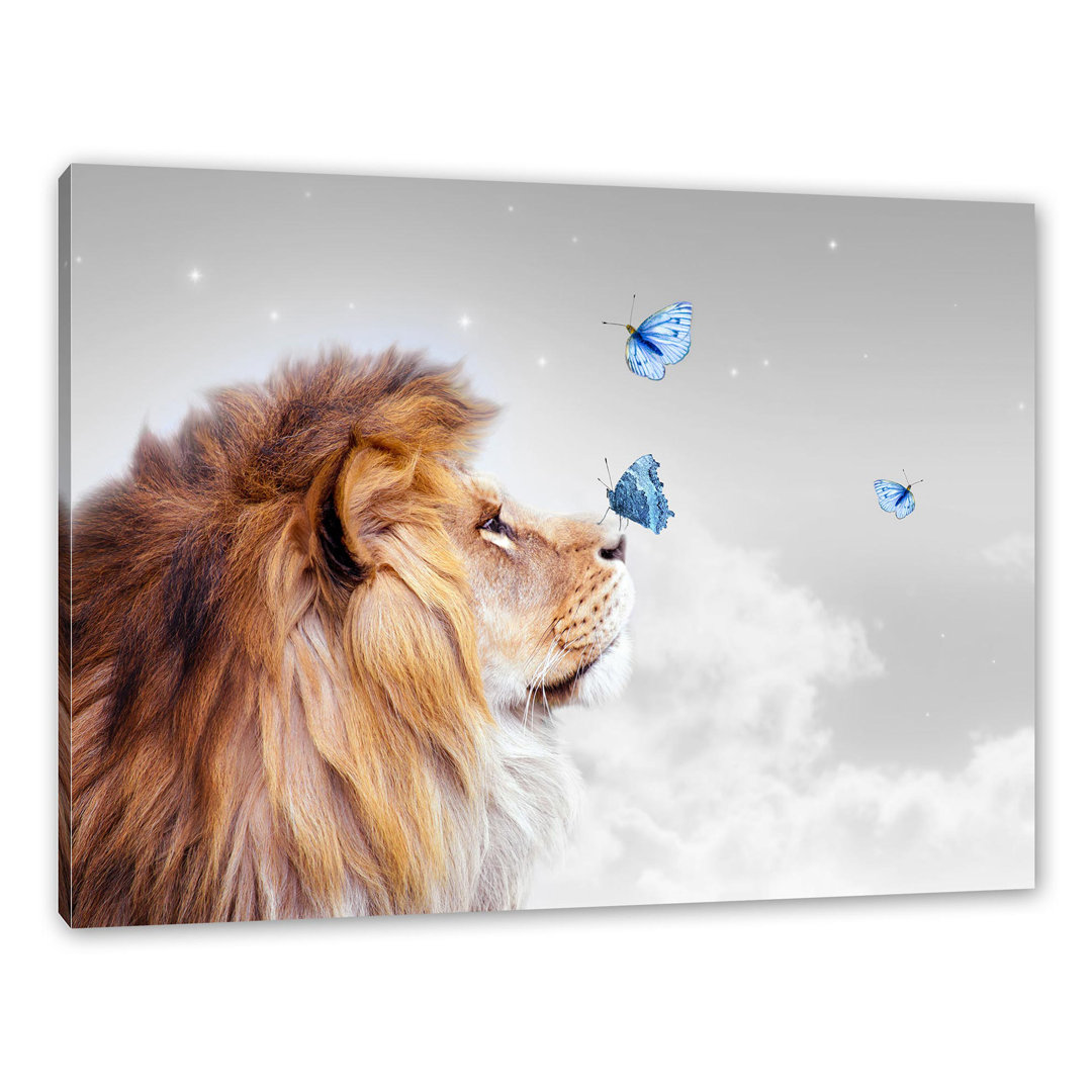 Leinwandbild Lion with Blue Butterflies