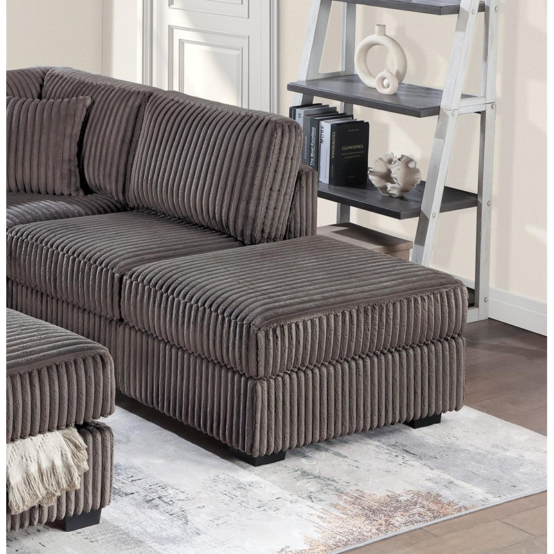 Sectional sofa with chaise longue and footstool