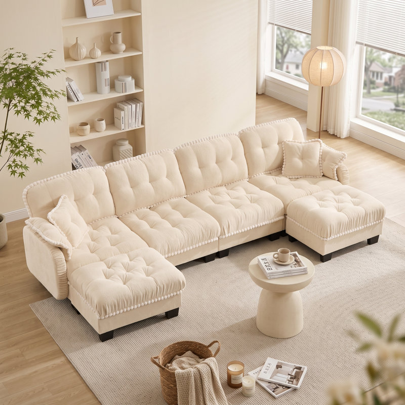 Canapé nuage 4 places beige crème en chenille avec 2 poufs amovibles, coussins capitonnés et finis à pompons
